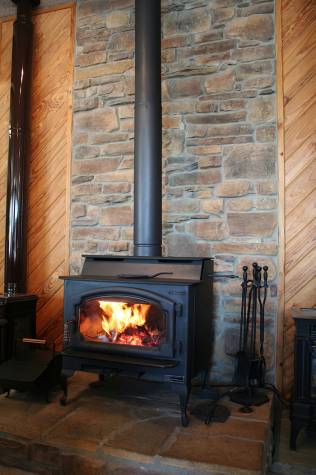 The Lopi Liberty wood burning stove heats our 3600 sq. ft showroom!